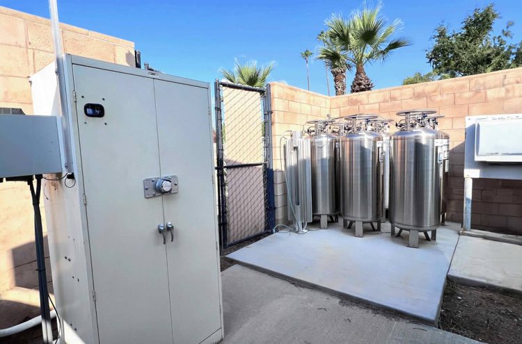 ECO2MIX pH control system with multiple CO2 tanks at a golf course, used for optimizing water pH levels for turf health